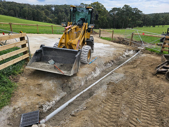 Pit and stormwater under driveway