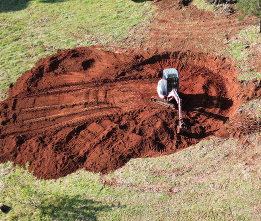 Site prep, levelling, grading, battering Site prep, levelling, grading, battering